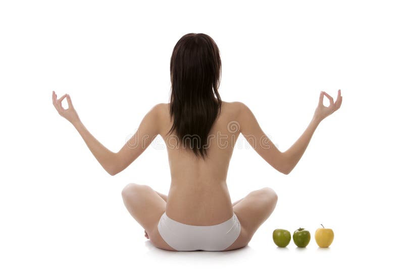 Girl practicing yoga on white