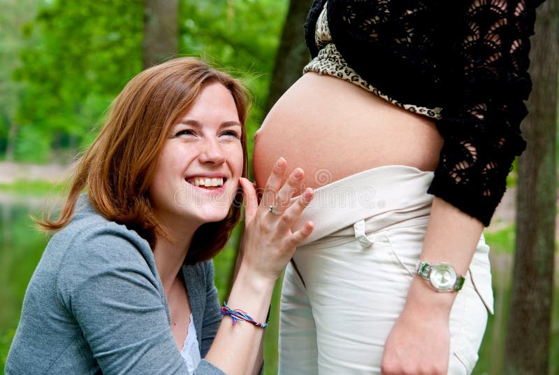 Girl and pregnant belly