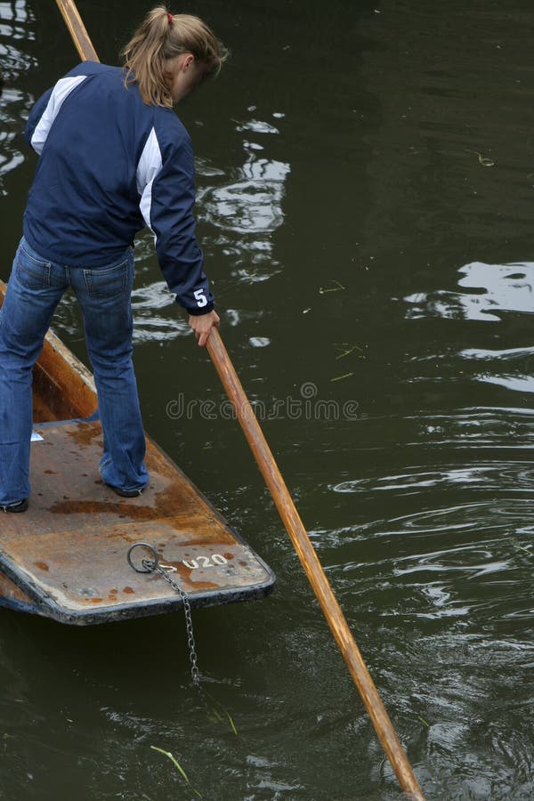 Girl punting at Cambridge