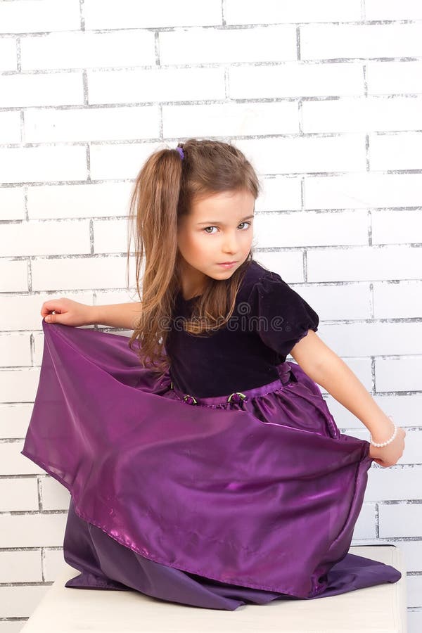 Girl in a purple dress