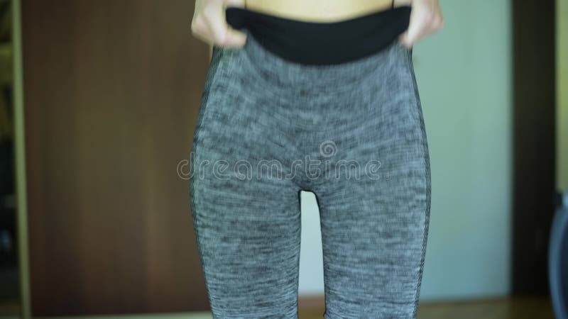 Girl Puts on and Pulls Up Sports Leggings, Getting Ready for Sports  Training Stock Footage - Video of fitness, tracksuit: 184354658