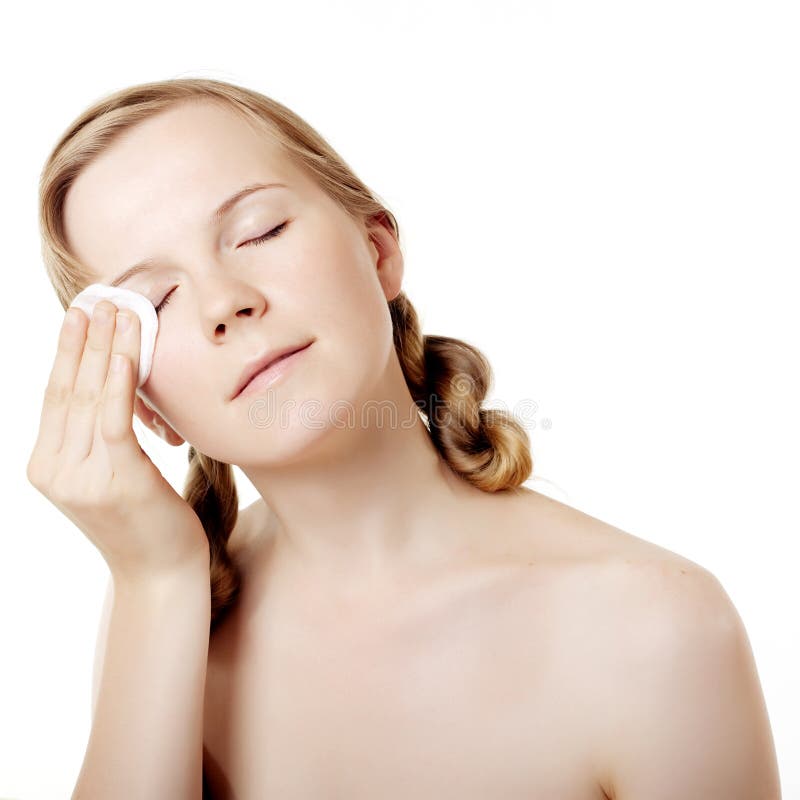 Girl puts on skin cream royalty free stock photo Girl puts on skin cream royalty free stock photo