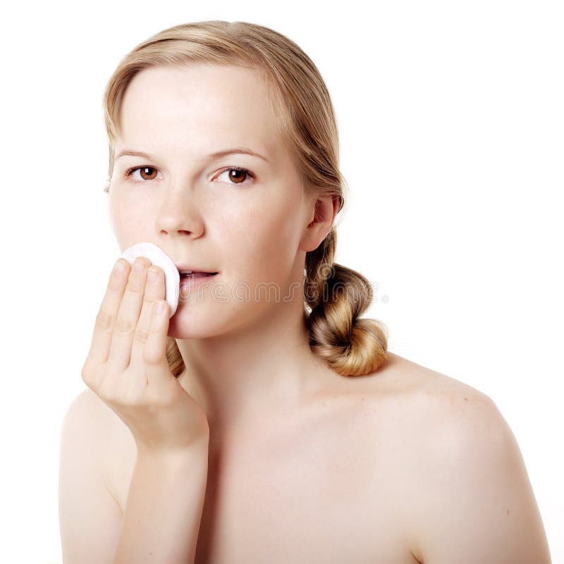 Girl puts on skin cream royalty free stock photos Girl puts on skin cream royalty free stock photos