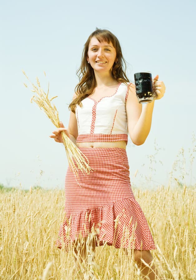 Girl with quass and wheat
