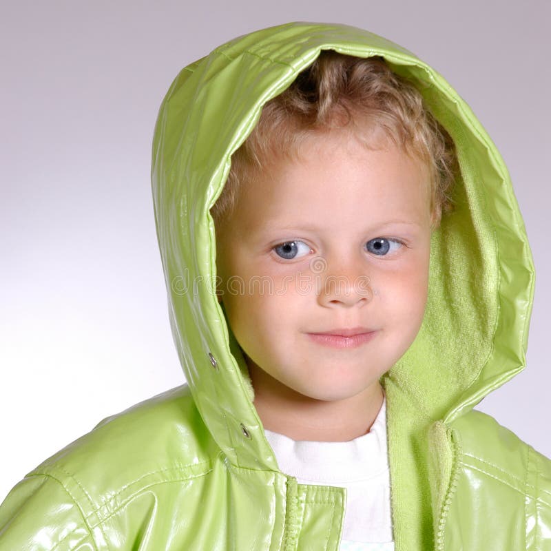 Girl in a raincoat stock photo. Image of female, slippery 2439446