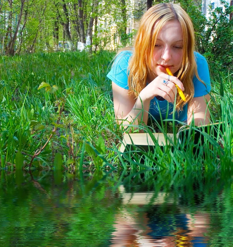 Girl reads the book.