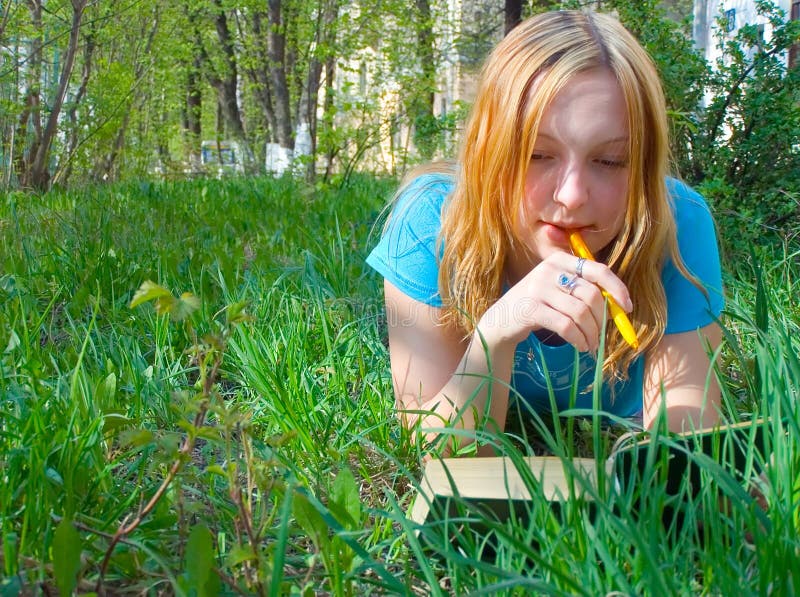 Girl reads the book.