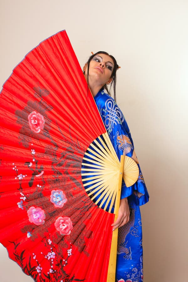 Girl with red asian fan
