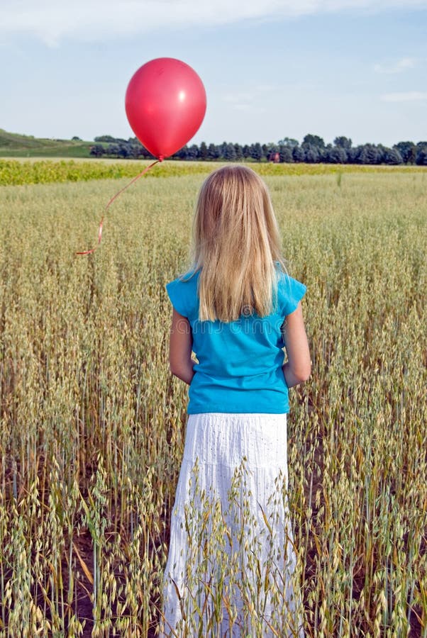 Girl with red balloon stock photo. Image of concept, agriculture 15660706