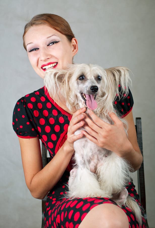 Girl in red and dog