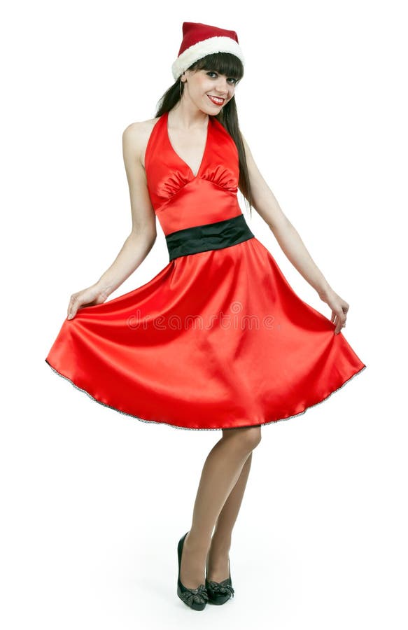 Girl in a red dress and hat santa