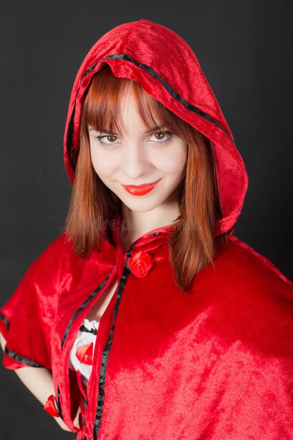 Girl in a red hood stock photo. Image of sensuality, elegance 60258932