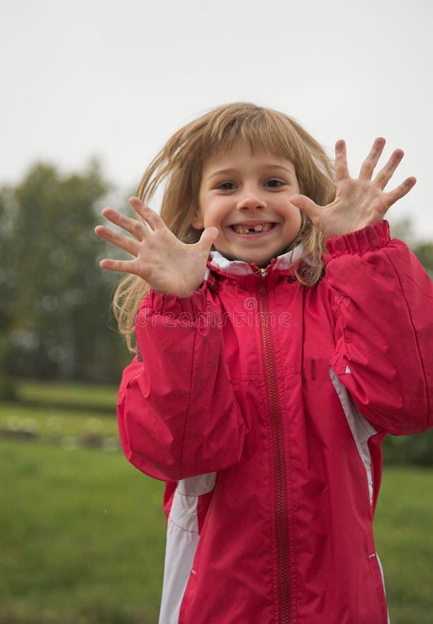 Girl In Red Jacket Picture. Image 1288343