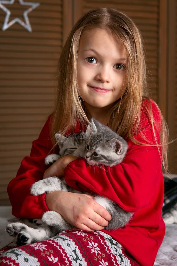 A Girl in Red Pajamas is Sitting on the Bed with Cute Kittens. Bright Emotion Stock Photo - Image of caucasian, children: 161991904 A Girl in Red Pajamas is Sitting on the Bed with Cute Kittens. Bright Emotion Stock Photo - Image of caucasian, children: 161991904