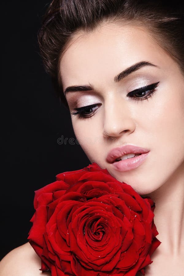 Woman with rose stock photo. Image of allure, female 21431672