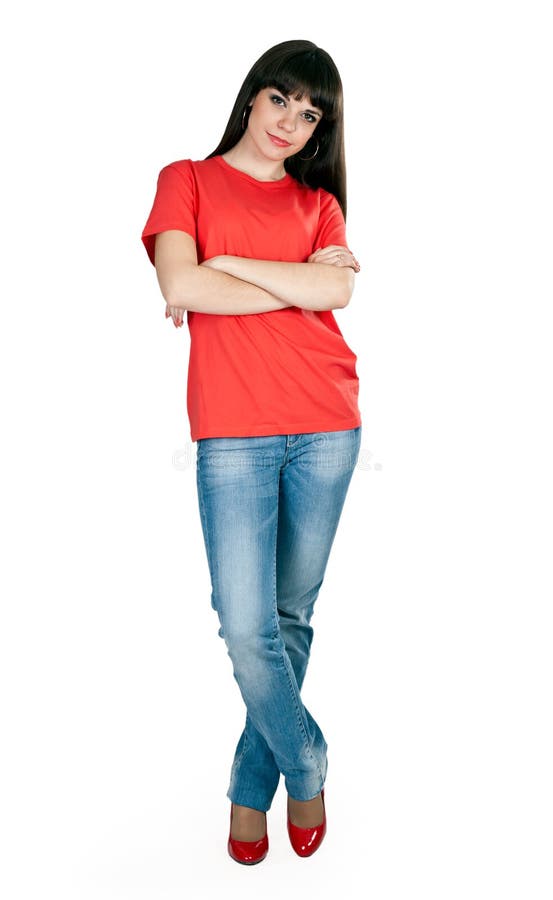 Girl in red shoes and blue jeans in the studio