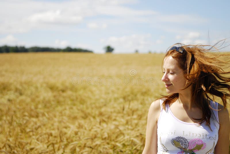 Girl relaxing in fields