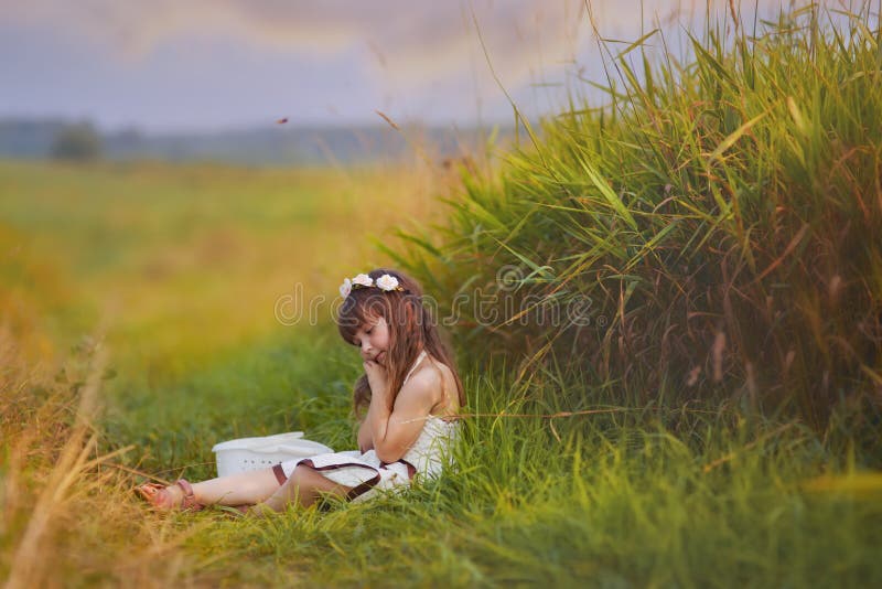 Girl relaxing in grass