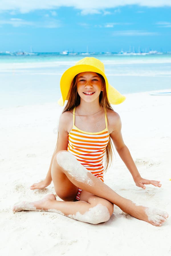 Girl relaxing on the island beach