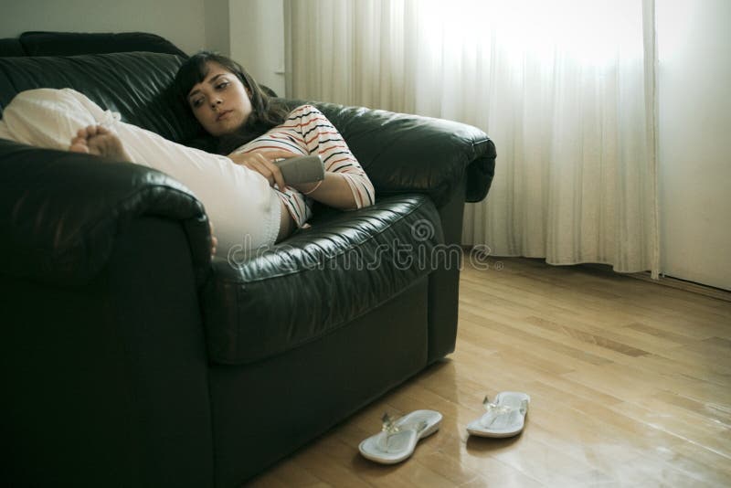 Girl with remote royalty free stock images Girl with remote royalty free stock images