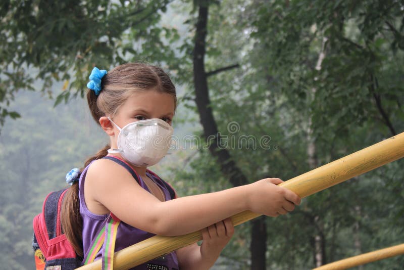 Girl in a respirator stock photo. Image of contagion 15601896