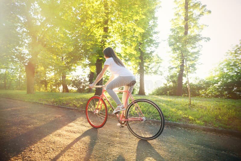 Girl Ride Bicycle on the Sunset Stock Image - Image of backpack ...