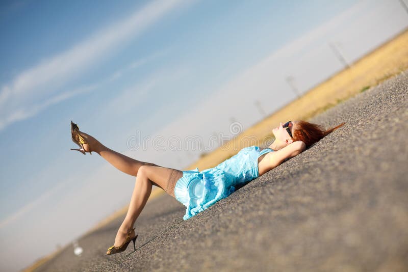 Girl on the road stock image