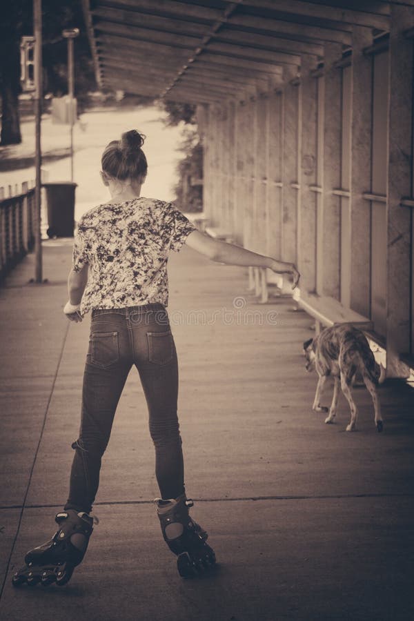 Girl on roller blades stock photo. Image of blades, young 46624056