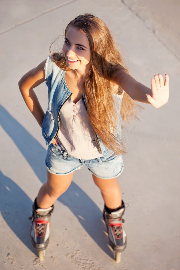 Girl on roller skates stock image. Image of outdoor, park 27196079