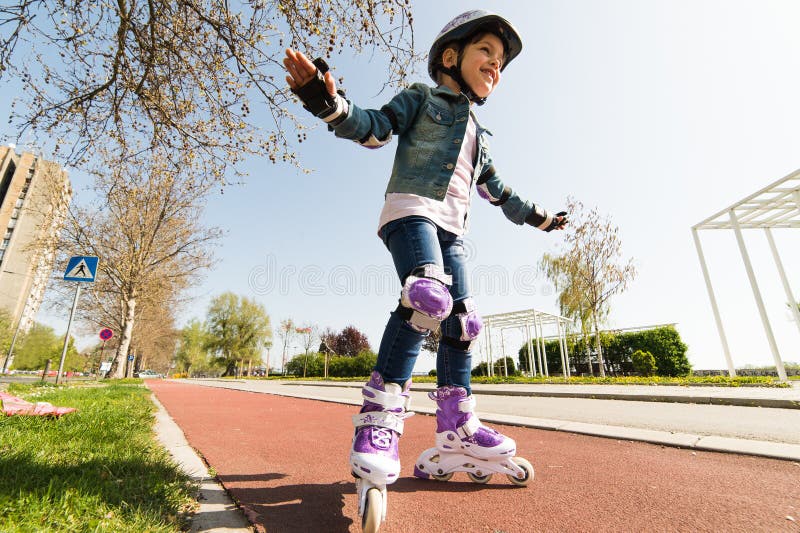 Girl on roller skates stock photo. Image of game, healthy 71164768