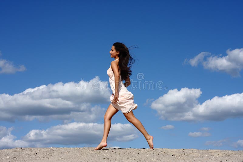 Girl running on the beach