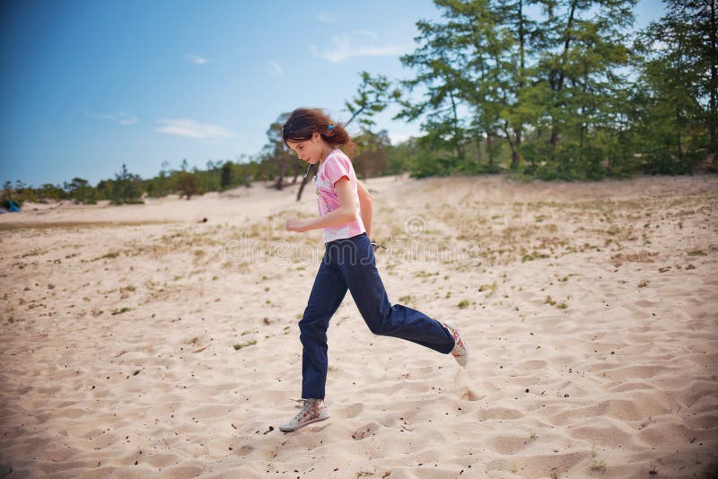 Girl Running in Olkhon Island Sand