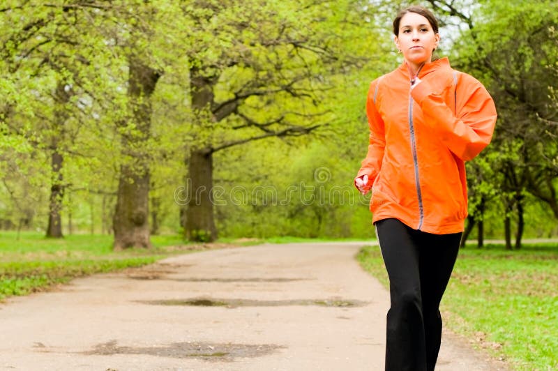 Girl running in park