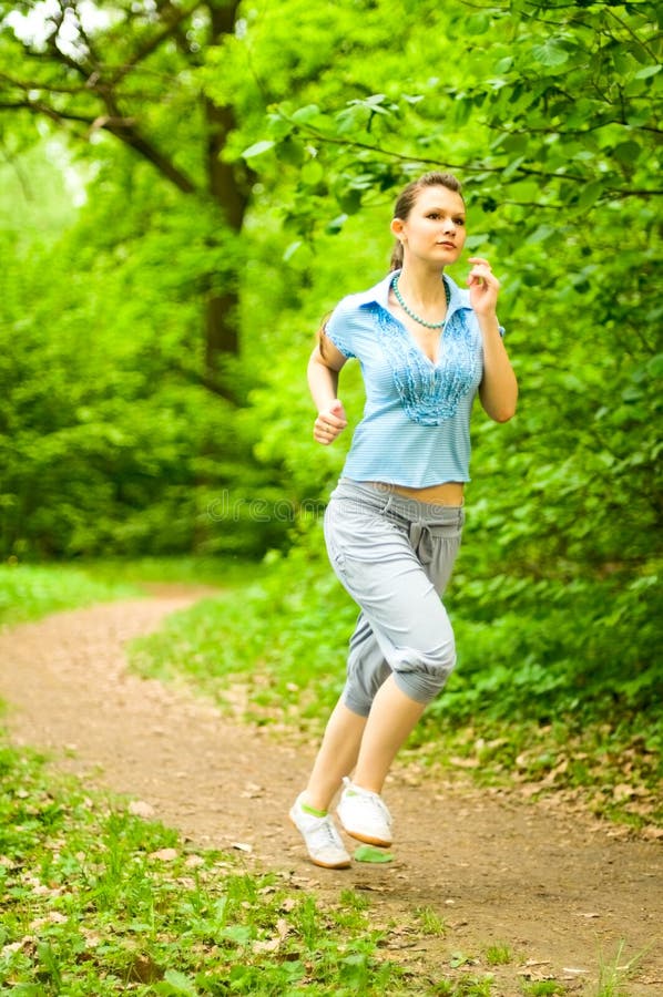 Girl running in park