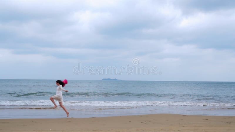 Girl Runs Along The Seashore In Slow Motion Stock Footage Video Of Dress People 89897448