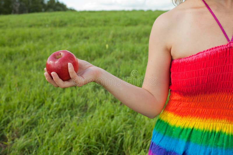 Girl's hand with apple stock image
