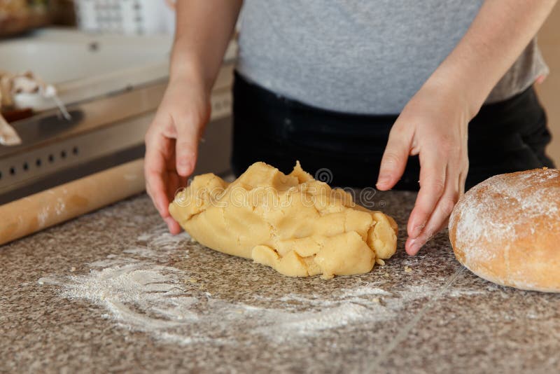 Girl`s Hands Kneading Dough in Flour on Table Stock Image Image of
