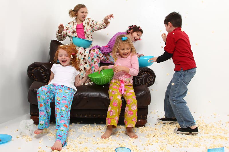 Girl's Slumber Party Sleepover Having Food Fight royalty free stock images Girl's Slumber Party Sleepover Having Food Fight royalty free stock images