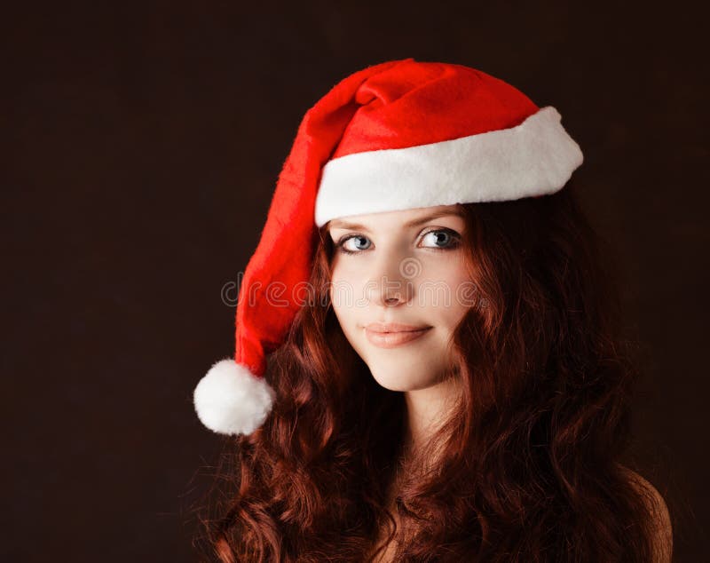 Girl in santa claus hat