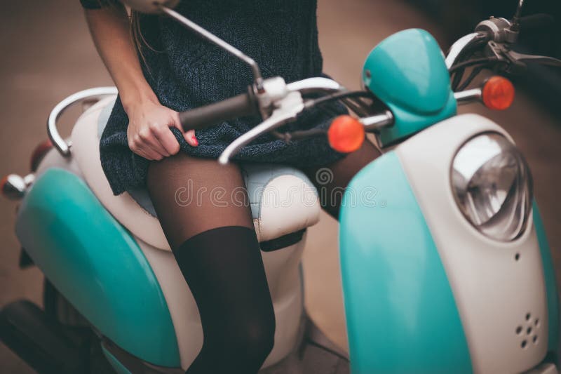 Girl seating on moto bike