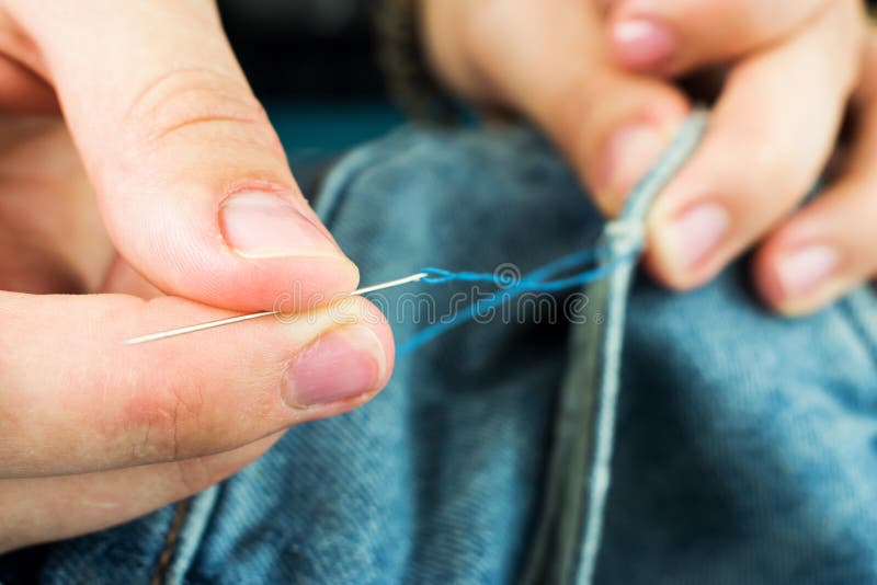 954 Hand Holding Sewing Needle Stock Photos Free & RoyaltyFree Stock