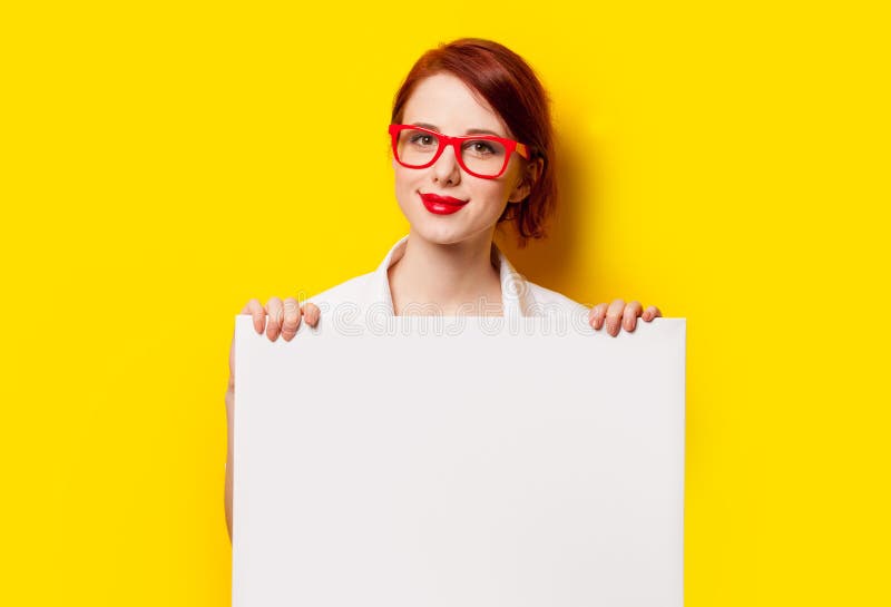 Girl in shirt and glasses with white board