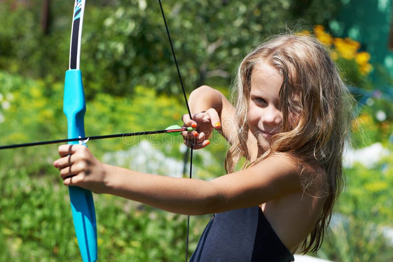 Girl shoots a bow