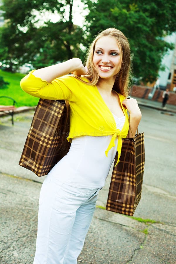 Girl with shopping bags stock photo. Image of gifts, optimistic 11841126