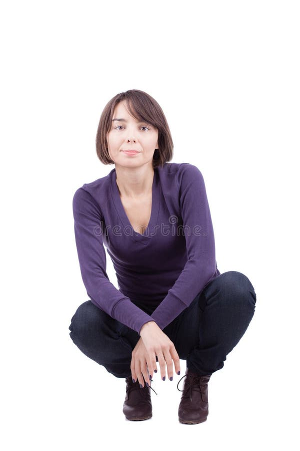 Crouching girl with short hair