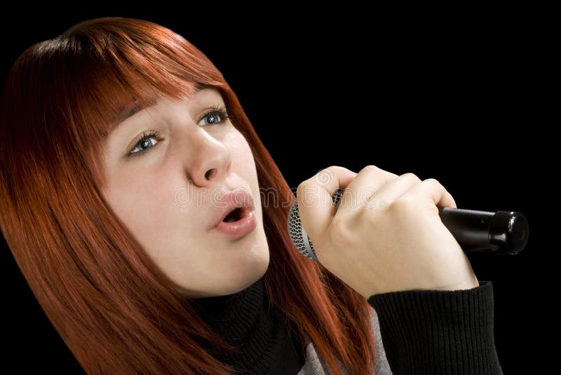 Girl singing on microphone