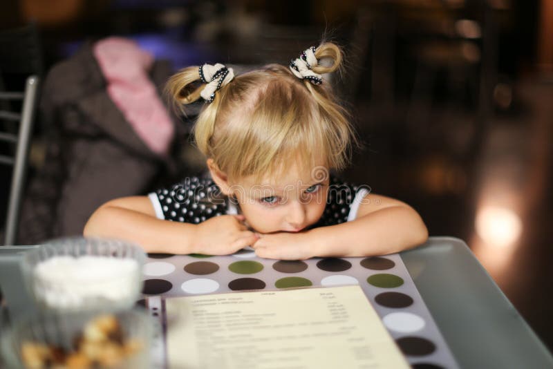 Girl sink head on arms. royalty free stock image Girl sink head on arms. royalty free stock image