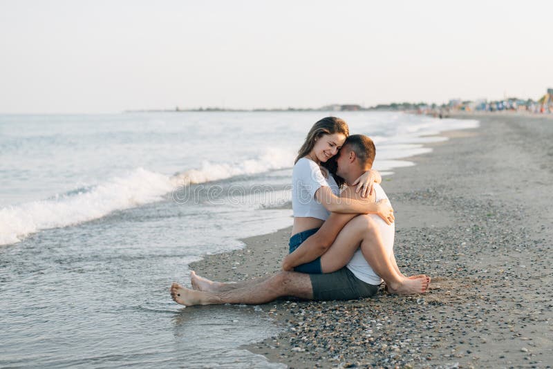 Girl Sitting On Boy Lap