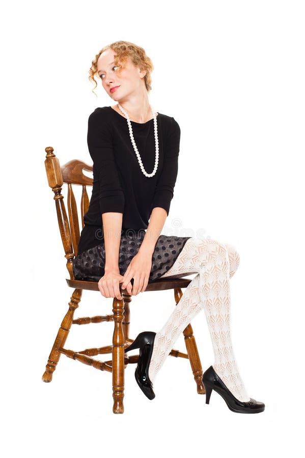 Girl sitting on a chair stock image. Image of look, thin 20979521