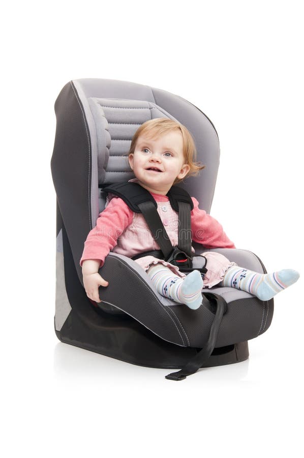 Girl sitting on child s car seat